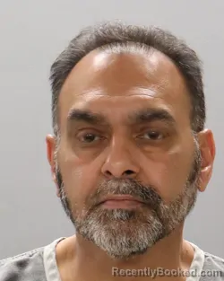 Mugshot of GIRISH DHIRUBHAI DESAI booked in Knox County, Tennessee on May 10, 2026