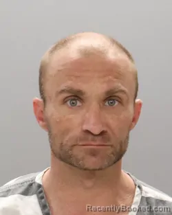 Mugshot of JORDAN ALEXANDER TAUXE