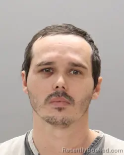 Mugshot of PHILLIP ALEXANDER RESTO