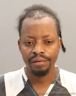 Mugshot of SENGIYUMVAN LEONARD