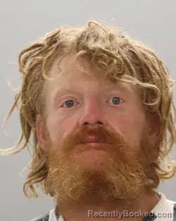 Mugshot of JUSTIN NEAL REED