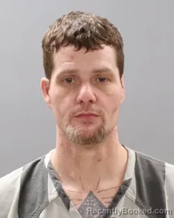 Mugshot of TRAVIS B BULLOCK