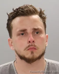 Mugshot of CALEB J ADKINS