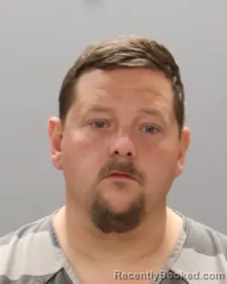 Mugshot of DEVIN HUGGINS