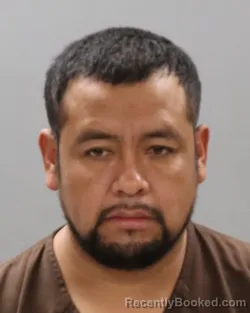 Mugshot of CARLOS SANTOS-ROSAS