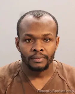 Mugshot of ENOCK AUGUSTIN