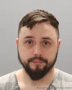 Mugshot of JUSTYN SETH LYNN MOORE