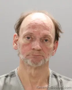 Mugshot of BURL ELVIS TOOMBS