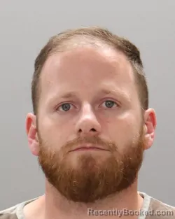 Mugshot of CODY D EVANS