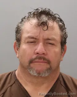 Mugshot of WILFREDO MENDOZA