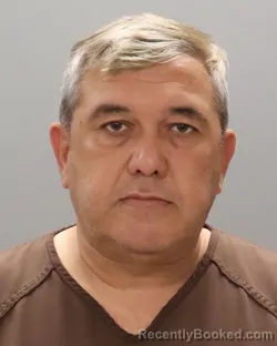 Mugshot of MANSURBEK NASIMOVICH YULDASHEV booked in Knox County, Tennessee on May 12, 2026
