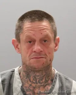 Mugshot of TRAVIS CLAYTON HOLLOWAY booked in Knox County, Tennessee on May 9, 2026