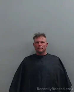 Booking photo from Harrison County, Texas