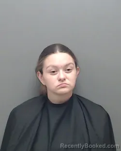 Mugshot of REGINA MICHELE SMITH booked in Harrison County, Texas on April 1, 2026