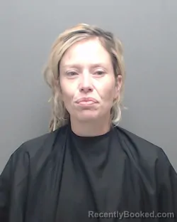 Mugshot of RANI PARKER HOLMES booked in Harrison County, Texas on May 12, 2026