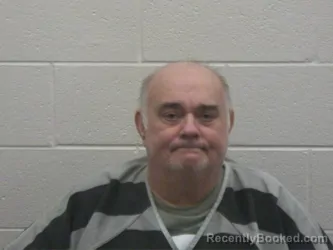 Mugshot of MICHEAL CARY GREUTMAN