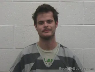 Mugshot of JUSTIN EVANS THOMPSON