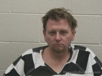 Mugshot of THOMAS RICHARD HESSON