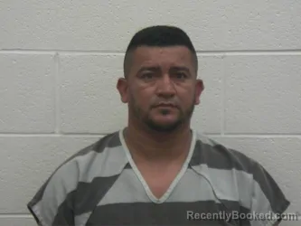 Mugshot of OSCAR EDGARDO FLORES AVILA booked in Loudon County, Tennessee on July 13, 2026