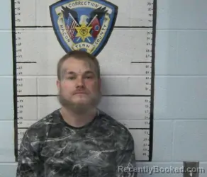 Mugshot of JOHNNY R RITTENBERRY booked in Macon County, Tennessee on March 20, 2026