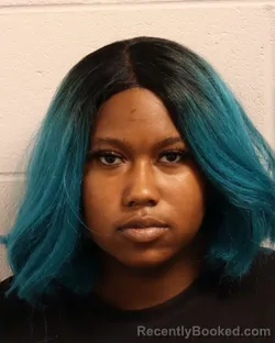 Mugshot of AQUAILA LASHYRIA BURGESS booked in Madison County, Tennessee on April 21, 2026