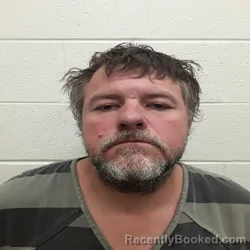 Mugshot of GUS IVEN MOORE