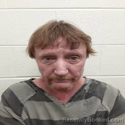 Mugshot of TRAVIS SHANE KILE