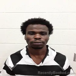 Mugshot of Ahmed Yussi Guruza booked in Monroe County, Tennessee on August 7, 2026