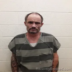 Mugshot of John Christopher Cox booked in Monroe County, Tennessee on October 10, 2026