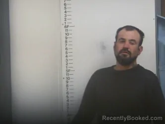 Mugshot of TOMMY R HAMMONS