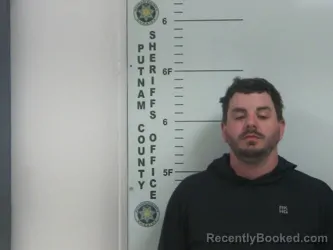 Mugshot of BRANDON M RHODES booked in Putnam County, Tennessee on March 29, 2026