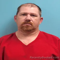 Mugshot of Travis Lynn Keyes booked in Roane County, Tennessee on July 21, 2026