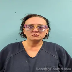Mugshot of BRANDI MOORE booked in Roane County, Tennessee on May 16, 2026