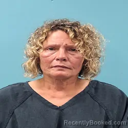 Mugshot of Rebecca Ann Farmer booked in Roane County, Tennessee on September 12, 2026