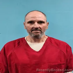 Mugshot of Travis Michael Sigmon booked in Roane County, Tennessee on October 22, 2026