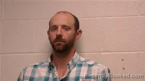 Mugshot of Kristopher Mitchell Dudley booked in Robertson County, Tennessee on August 23, 2026