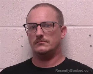 Mugshot of Richard Daniel Ezzell booked in Robertson County, Tennessee on July 27, 2026