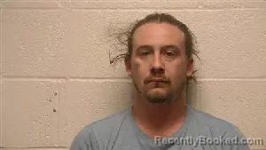 Mugshot of Adam Matthew Misencik booked in Robertson County, Tennessee on April 15, 2026