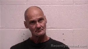 Mugshot of John Richard Moore booked in Robertson County, Tennessee on April 20, 2026