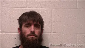 Mugshot of Jason Allen Wooden booked in Robertson County, Tennessee on April 10, 2026