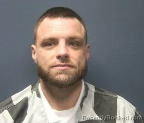 Mugshot of DUSTIN D STINNETT