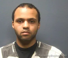 Mugshot of SAMUEL MOMMAHAD AKRAM
