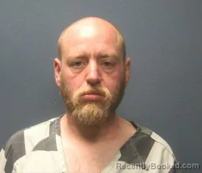 Mugshot of JUSTIN TODD COOLEY