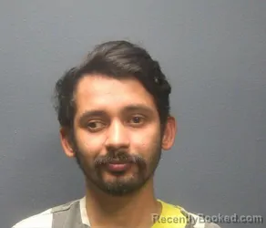 Mugshot of Bishnu Dhakal booked in Sevier County, Tennessee on August 20, 2026