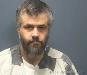 Mugshot of ERIC DALE NEWMAN booked in Sevier County, Tennessee on August 4, 2026