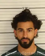 Mugshot of AHMAD MOTASEM ALSERAFEI booked in Shelby County, Tennessee on April 10, 2026