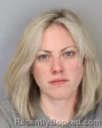 Mugshot of ELIZABETH MILNOR booked in Shelby County, Tennessee on March 24, 2026