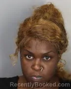 Mugshot of Omaria Shanice Sledge booked in Shelby County, Tennessee on August 28, 2026