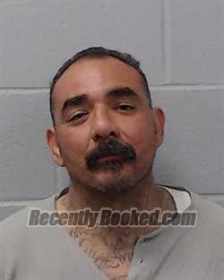 Booking photo from Hays County, Texas