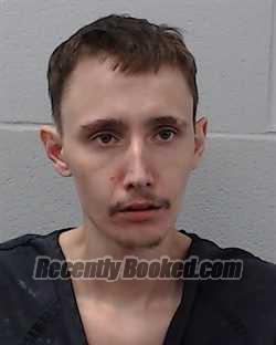 Booking photo from Hays County, Texas